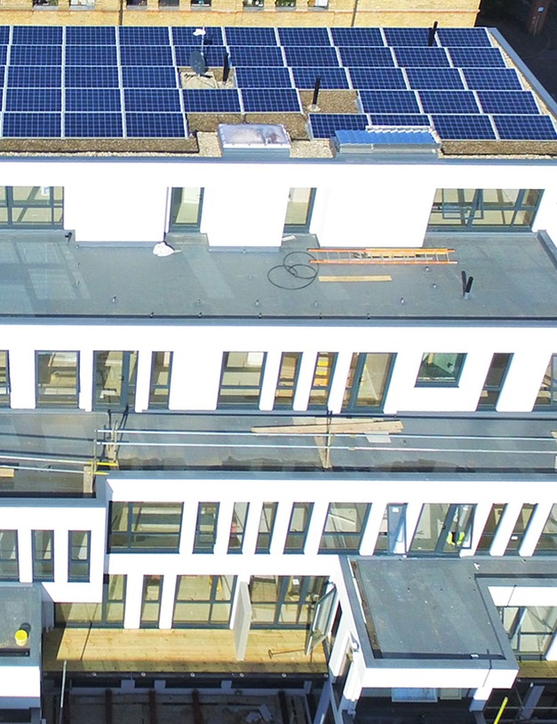 Completed commercial roof edge with skyline