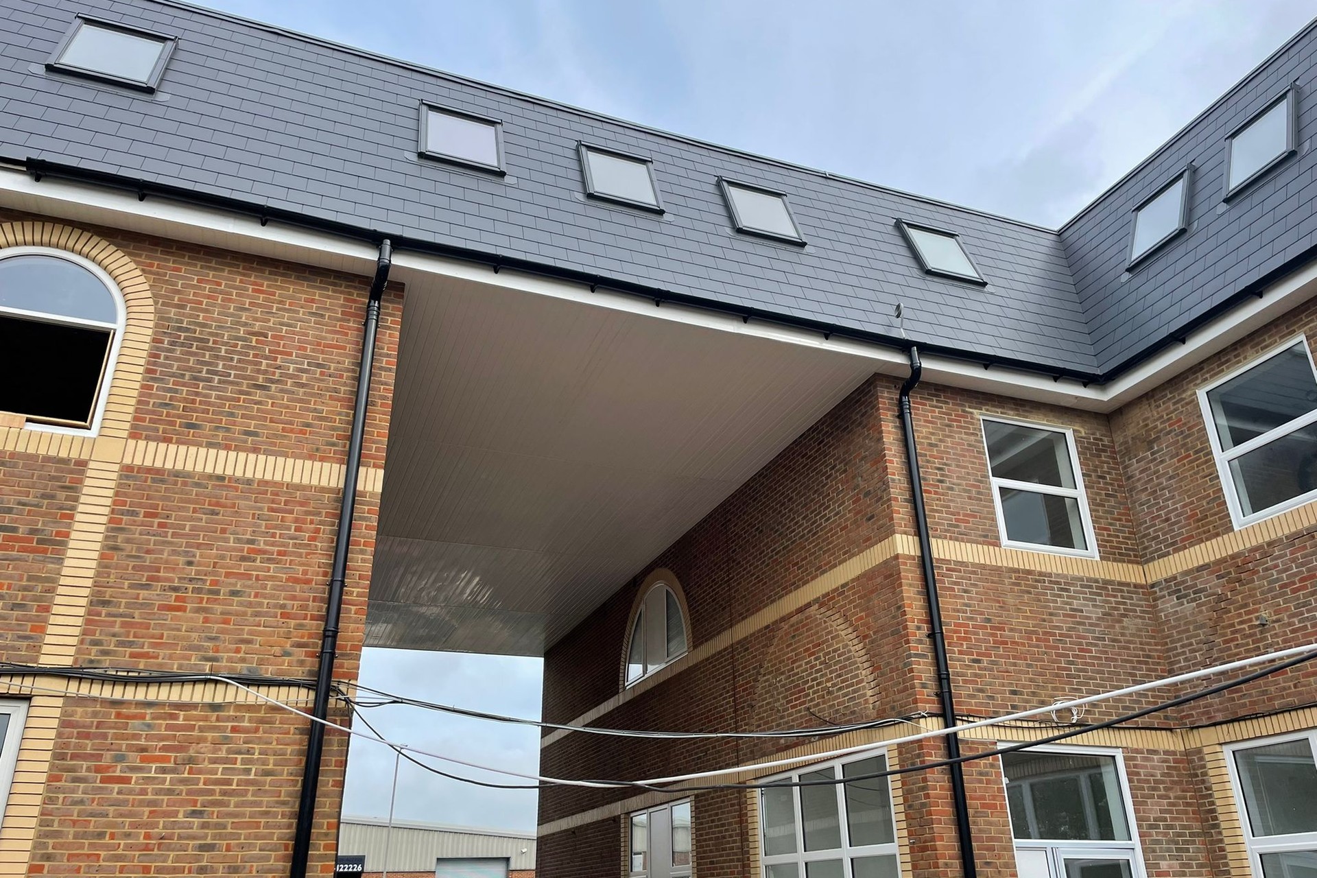 Tile and slate roof detailing with lead flashing